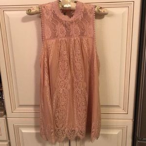 Beautiful lace sleeveless top.